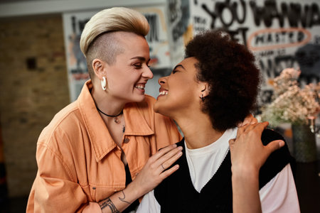 Diverse, beautiful women standing together in a cafe.の写真素材