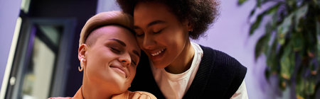 A diverse, beautiful couple of lesbians standing together in a cafe.