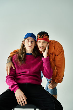 two men strike a pose for a photo, exuding joy and love.
