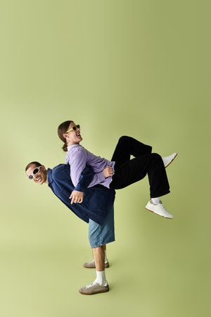 Two men posing peacefully before a vibrant yellow backdrop.