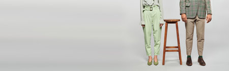 Loving couple standing on stool, pose gracefully.