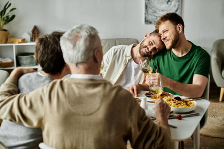 A gay couple sits at a dining table with their family, enjoying a meal and conversation.
