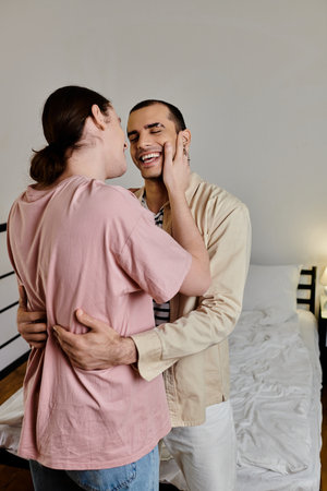 A young gay couple embraces in their modern apartment, radiating love and happiness.