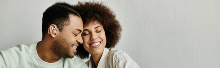 An African American couple in their home.
