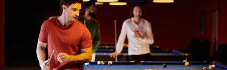 Friends gather around a pool table for a casual game of billiards, laughing and enjoying each others...