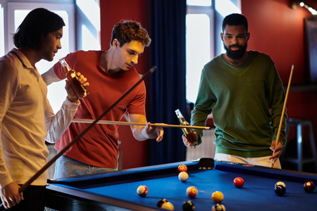 Friends play billiards in a casual setting.