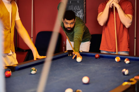 A group of friends enjoy a game of billiards, showcasing their casual style and playful spirit.
