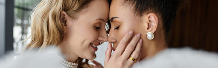 A lesbian couple shares a loving moment on their wedding day.の写真素材