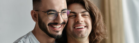 Two men with joyful smiles share a moment of intimacy.
