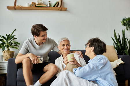 A loving LGBTQ family enjoys quality time together, sharing smiles and laughter in their cozy living...