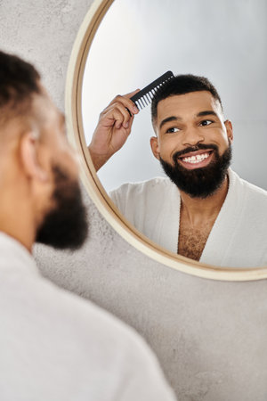 Man with a beard enjoys grooming while smiling in front of a mirror.の写真素材