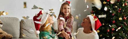 A joyful holiday celebration with a loving couple and their daughter playing and laughing together.
