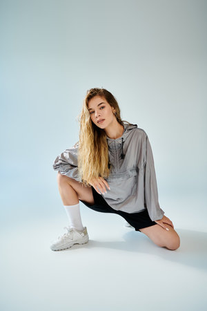 A talented sportswoman expresses emotion while showcasing her athleticism and style during training.の写真素材