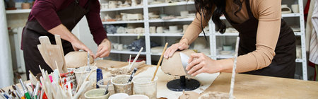 A couple crafts beautiful pottery in a spacious modern studio.