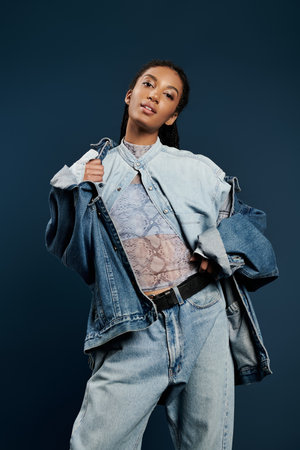 A young woman showcases her fashion sense in stylish denim, exuding confidence and creativity.