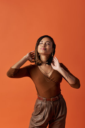 A young woman with braided hair showcases her stylish outfit in a vibrant studio, exuding confidence...