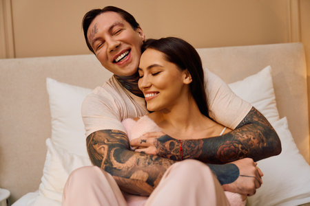 A man and woman embrace happily, radiating warmth and affection for each other in their space.の写真素材