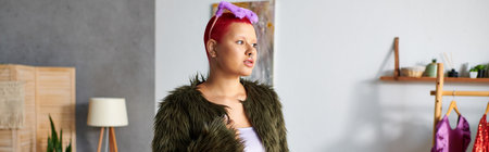 The young woman expresses her individuality with a striking outfit and vibrant hairstyle at home.