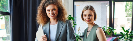 Coworkers proudly showcase their professionalism and support for the LGBTQ community.の写真素材