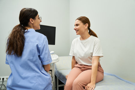 Gynecologist provides personalized consultations for female patients in a modern setting.
