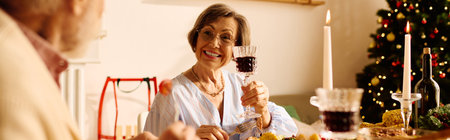 The loving couple enjoys a festive Christmas dinner at home, surrounded by holiday cheer.