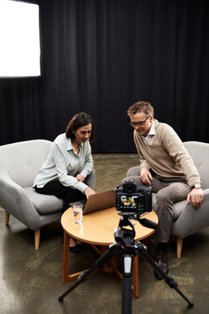 A middle-aged journalist interviews a professional specialist, fostering an insightful discussion in...