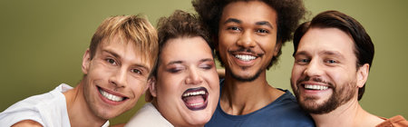 Four friends smile together, showing pride and support for the LGBTQ community.の写真素材