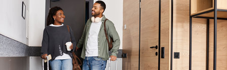 A joyful couple shares a moment of love and laughter in their hotel room, savoring each others...