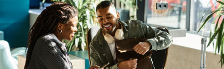 A cheerful young couple discusses their travel plans while surrounded by a lively hotel atmosphere.