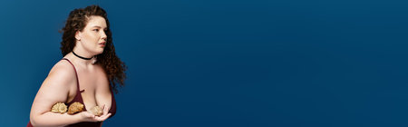 Young woman embraces her fashion style with confidence, posing gracefully in a stunning outfit.の写真素材