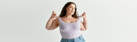 A confident young woman poses in trendy attire, highlighting her unique style and personality.の写真素材