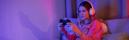 A teenage girl enjoys a gaming session in her cozy, modern room filled with evening light, banner