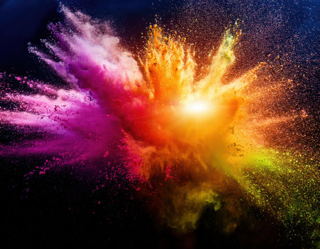 Colorful powder bursts radiate joy and energy during the Holi festival, celebrating spring.の素材