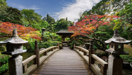 Explore a vibrant summer garden with a picturesque wooden bridge and colorful foliage.の素材