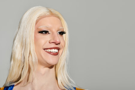 A confident drag queen showcases a trendy and chic style, capturing attention with vibrant colors.