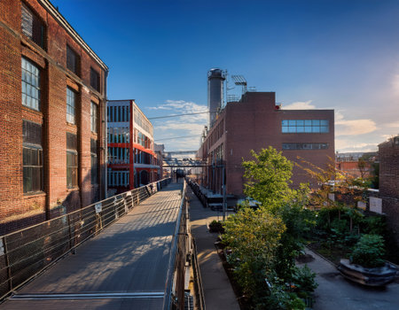 A vibrant mix of old and new structures highlights urban development during sunset.の素材