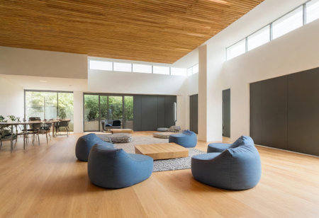 Spacious indoor area features cozy seating and a warm wooden ceiling, perfect for gatherings.の素材