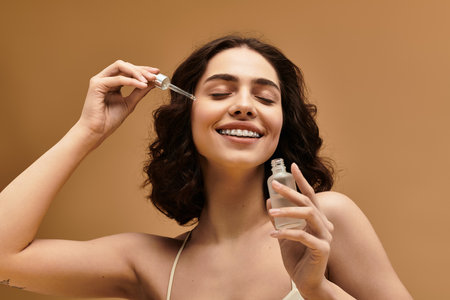 Charming young woman with braces applies skincare serum while enjoying her beauty routine.のeditorial素材