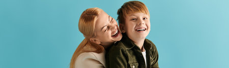 A woman embraces her son with laughter, radiating love and joy in a bright blue setting at home.