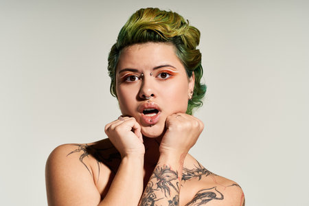 Beautiful woman captures attention with unique style and colorful hair in a polished setting.のeditorial素材