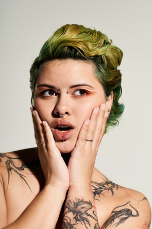 A stunning woman showcases bold makeup and colorful hair in a modern setting.のeditorial素材