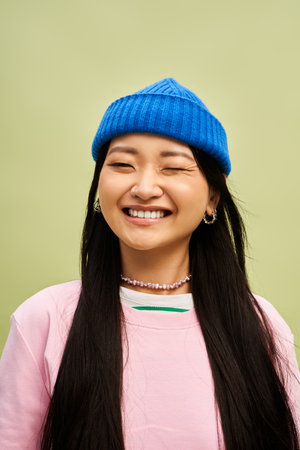 Cheerful beautiful woman in casual stylish clothing posing cheerfully.のeditorial素材