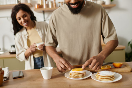 A joyful couple enjoys preparing breakfast together with love and laughter in their cozy kitchen.