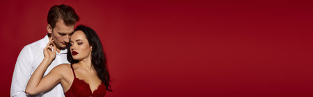 The couple is wrapped in love, gazing into each others eyes with deep affection and allure.のeditorial素材