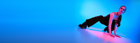 A young woman strikes a stylish pose amid vibrant blue and pink lights, banner