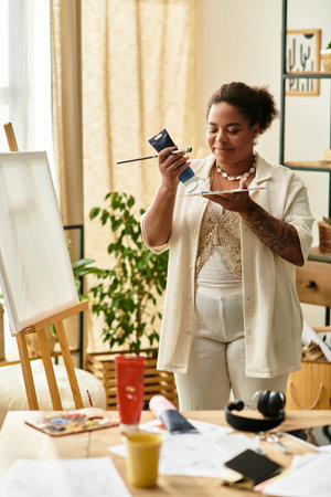 A beautiful woman enjoys her time at a crafting workshop, fully immersed in her art.