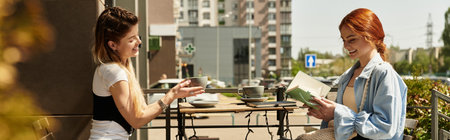 Best friends engage in lively conversation while enjoying coffee outdoors in a cafe, banner