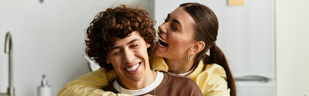 A joyful couple shares laughter in their cozy home during a peaceful afternoon, embracing love.
