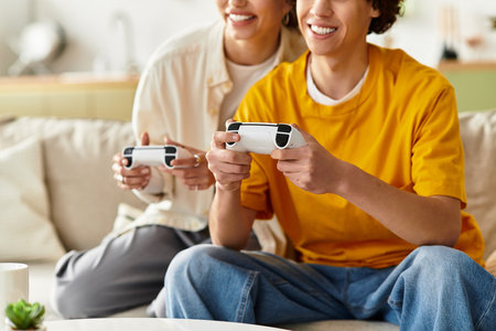 Two partners share laughter and excitement while gaming together in their comfortable living space.