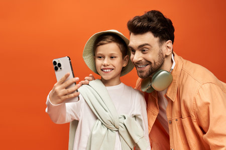 Fathers Day 2025 A joyful moment full of laughter and togetherness for father and son.の写真素材